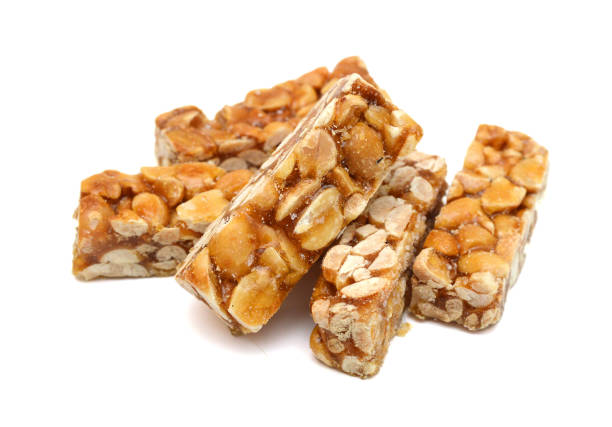 istock Honey bars with peanuts, sesame and sunflower seeds isolated 1761747463