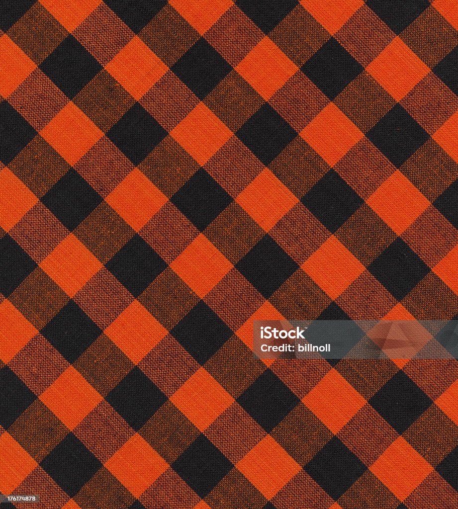 Tela con naranja y negro de patrones - Foto de stock de A cuadros libre de derechos