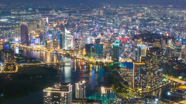 istock Aerial sunset view at Landmark 81 - it is a super tall skyscraper and Saigon bridge with development buildings along Saigon river 1761751912
