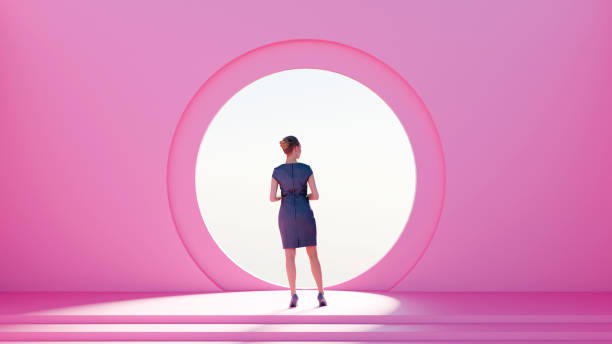 istock Woman Stands Before a Pink Wall with a Hole 1761792227