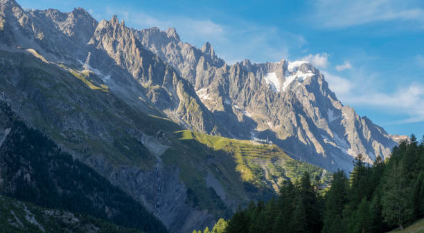 Grand Jorasses massif from Val Veny valley in the evening light. stock photo