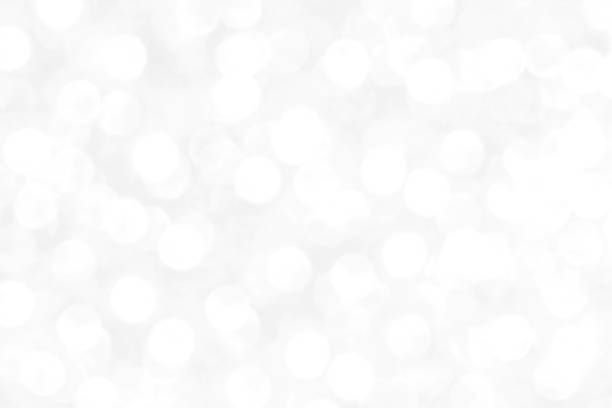 istock White and gray bokeh background. Celebration background. 1761989645