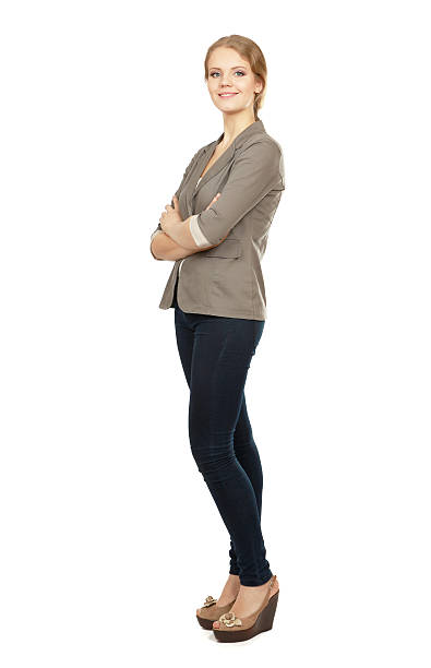 istock young woman standing in full length 176200370