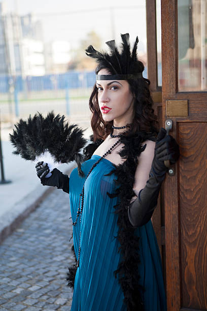 istock beautiful woman with feather dusters 176202114