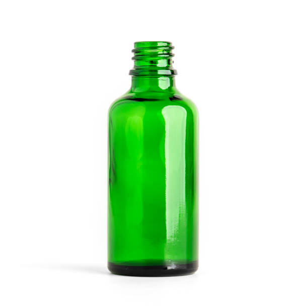 istock Glass Bottle. Green color bottle on white background. Empty bottle for general use. Cosmetic, medicine, healthcare. 1762023806