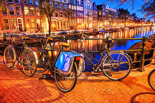 istock Bridge with Bicycle and Water Channel in Amsterdam at Night 176203886