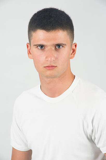 istock Furious teen looking with anger 176203986