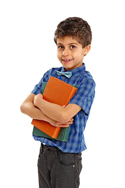 istock Adorable little schoolboy standing on white 176204315