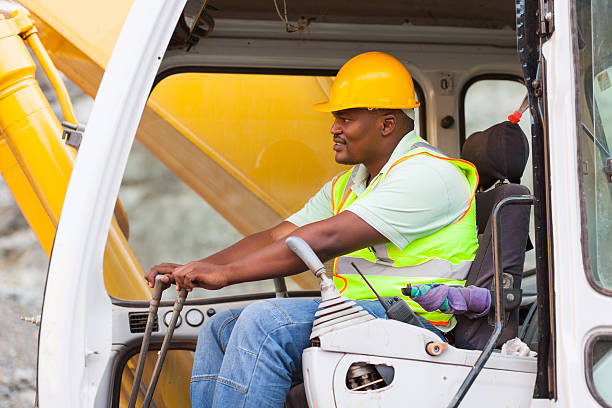 istock africa american man operates excavator 176204732