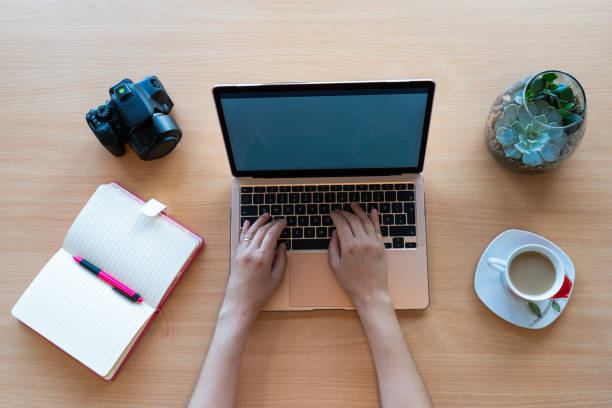 istock Hands of photographer working on laptop 1762065662