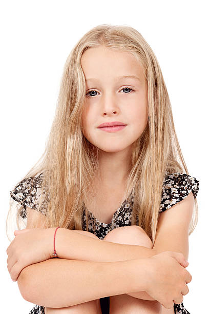 Smile, gorgeous. Portrait closeup of funny, excited joyful girl female child laughing kid smiling girl long hair looking at you isolated white background wall. Positive human emotion facial expression