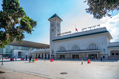 Casablanca, Morocco - Sep. 12 2023: Casa-Voyageurs railway station (Arabic: محطة الدار البيضاء المسافرين‎) is an ONCF station in the city centre. The station is served by suburban and long-distance trains. Morocco flags flown at half-mast to mourn earthquake victims.