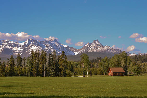 Cтоковое фото Glacier Паркуют красный Cabin