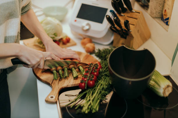 istock Cutting vegetables and separating compost waste in the kitchen 1762213848