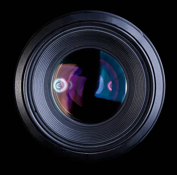 Photo of Close up of a large camera lens