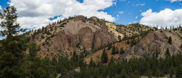 istock Rock cliff panorama in the late afternoon mountains 1762222161