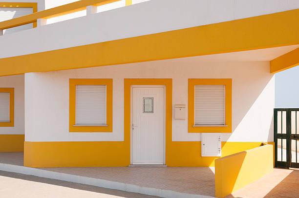 istock White and Yellow Mediterranean-Style House 176230419