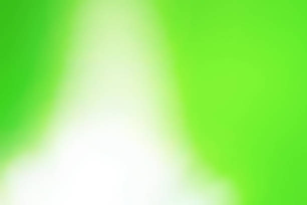 Dazzling fluorescent yellow-green background with white color splashing towards the bottom.