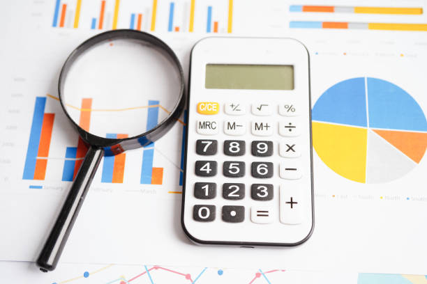 istock Magnifying glass on charts graphs paper. Financial development, Banking Account, Statistics, Investment Analytic research data economy. 1762347165