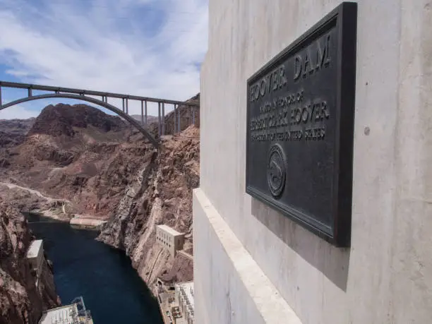 A sweeping vista from the Hoover Dam offers a stunning perspective of the Colorado River and the magnificent Mike O'CallaghanâPat Tillman Memorial Bridge.