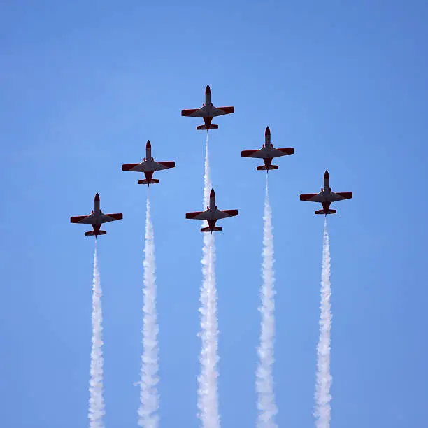 Photo of Spanish Air Force Aerobatics team performing a a fly-past in 'Arrow-Head' formation at the Karup airshow