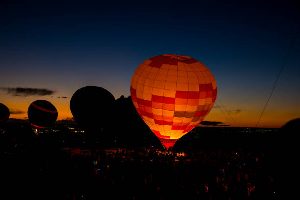 istock Hot Air Balloons Glowing at Sunset 1762354189