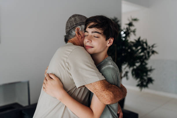 istock Grandson being welcomed by his grandfather 1762355799