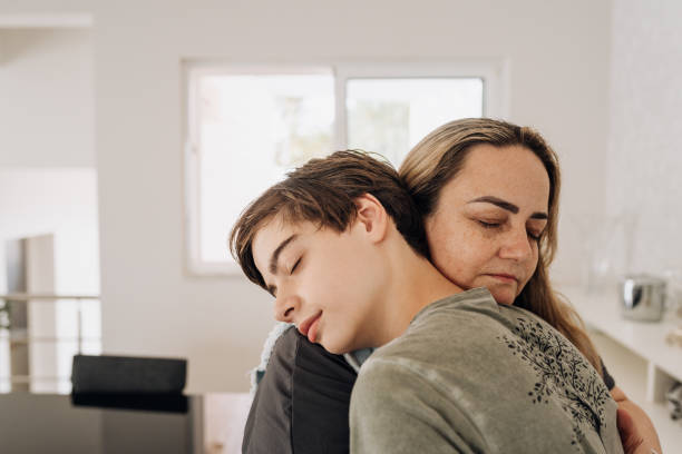 istock Mother and son hugging together 1762355812