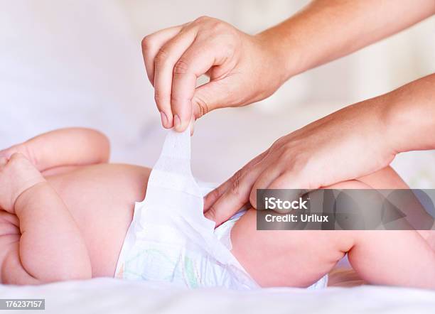 Making Sure Its Fastened Correctly Stock Photo - Download Image Now - Diaper, Baby - Human Age, Changing Diaper