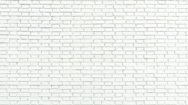 istock White brick wall texture background for stone tile block painted in grey light color wallpaper modern interior and exterior and backdrop design 1762392801