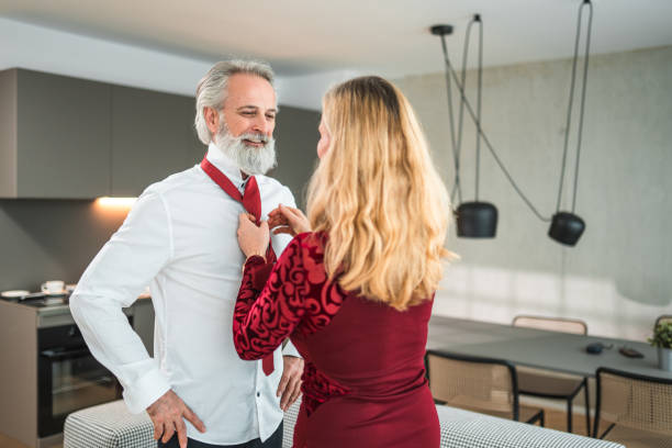 istock Mature Couple Dressing Up For Gala Event 1762410969