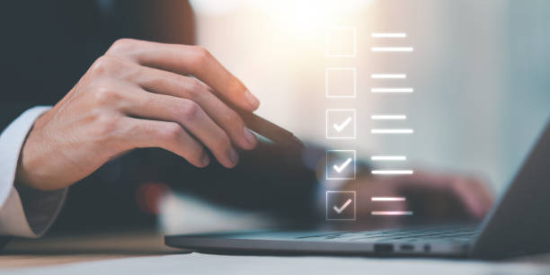 istock accountant Audit documents makes mark on the survey topic ,Checklist with checkmarks and checkboxes ,quality assessment management ,business document evaluation process, market data report analysis 1762505732