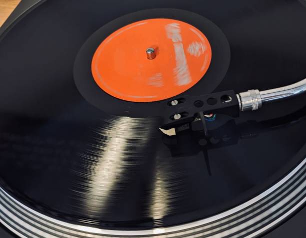 istock View of playing record on the analog turntable. 1762542283