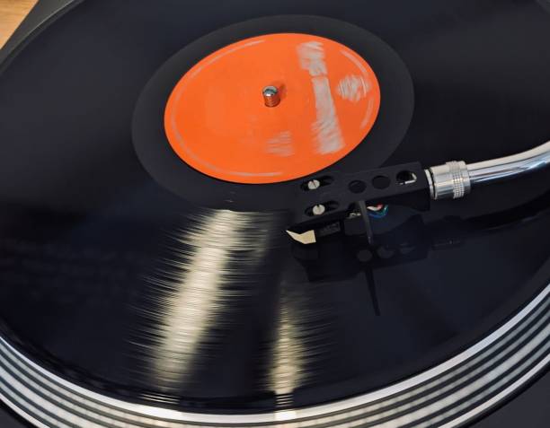 View of playing record on the analog turntable. View of playing record on the analog turntable. number 33 stock pictures, royalty-free photos & images