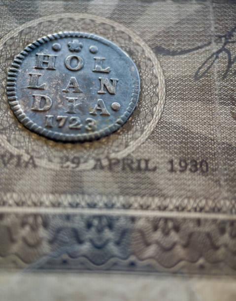 istock Hollandia Coin and Old Dutch banknotes 1762571367