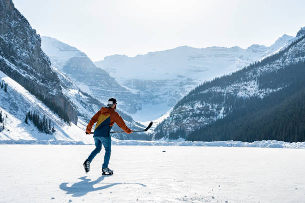 Hockey player on Lake Louise, Canada