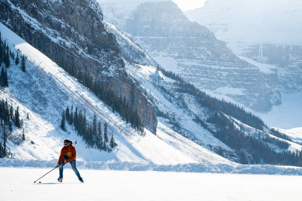 istock Hockey player on Lake Louise, Canada 1762618385