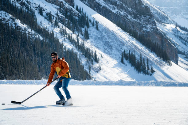 istock Hockey player on Lake Louise, Canada 1762618388