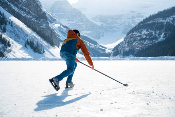 istock Hockey player on Lake Louise, Canada 1762618389