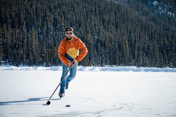 istock Hockey player on Lake Louise, Canada 1762618394