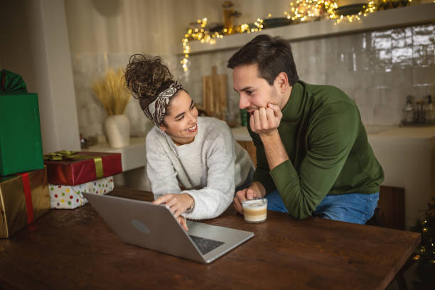 istock Young couple shopping online for Christmas 1762714541