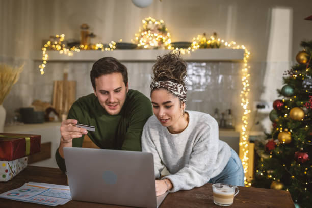 istock Young couple shopping online for Christmas 1762715065