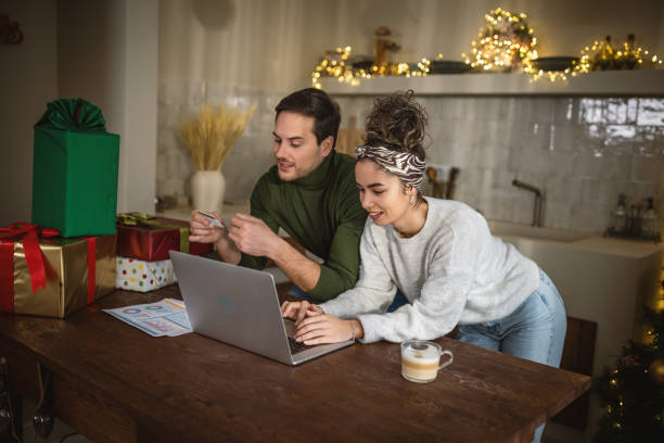 istock Young couple at home for Christmas 1762725580