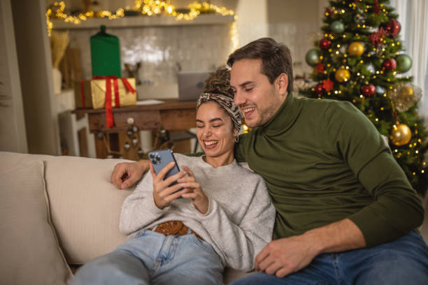 istock Young couple at home for Christmas 1762727128