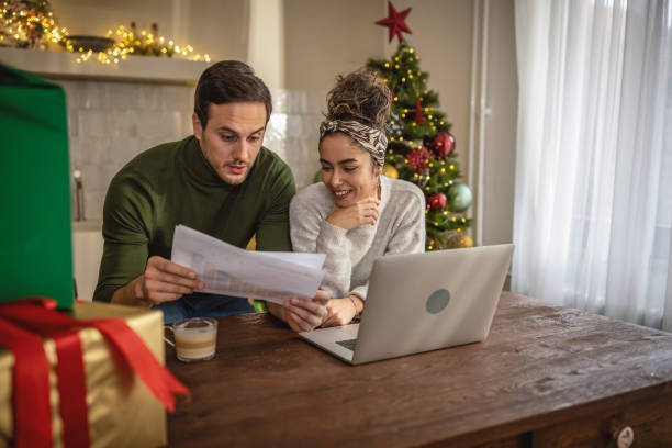 istock Young couple managing finances at home 1762729192
