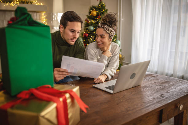 istock Young couple managing finances at home 1762732501