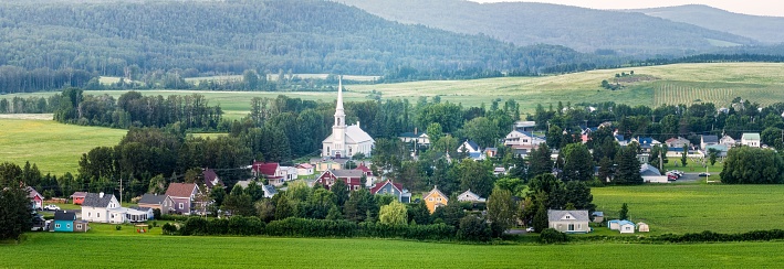An idyllic panoramic shot of St-Donat with a picturesque church.