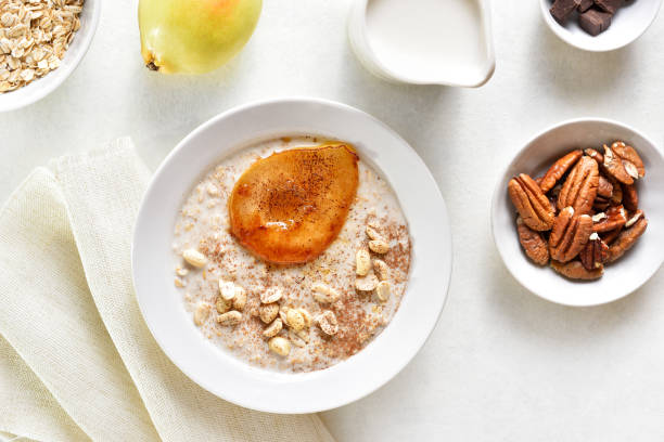 istock Oat porridge with caramelized pear and peanut 1762762552