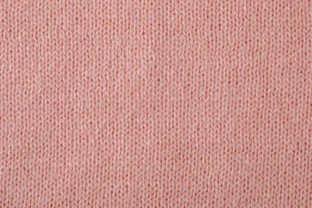 istock Sweater texture background. Pink knitted texture abstract background 1762763648