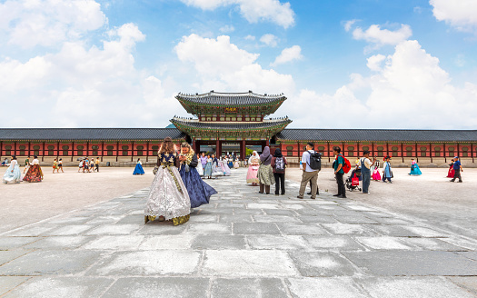 Seoul, South Korea: July 2, 2023: Gyeongbokgung Palace is a famous historical landmark, The Visitors can visit for free if they wear Korean national costumes or hanbok.